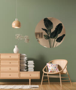 Wandspiegel rond brons aan de muur geplakt